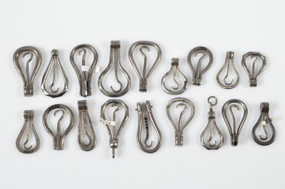 Lot 523 - A collection of 19th Century steel folding hinged loop miniature button or glove hooks