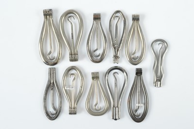 Lot 524 - A collection of 19th Century steel folding hinged button hooks