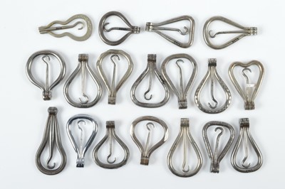 Lot 526 - A collection of 19th Century steel folding hinged button hooks