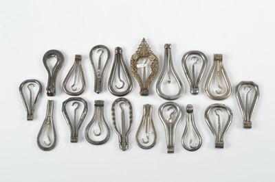 Lot 527 - A collection of 19th Century steel folding hinged button hooks