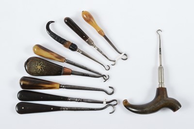 Lot 547 - Nine small button or glove hooks having bone and horn handles