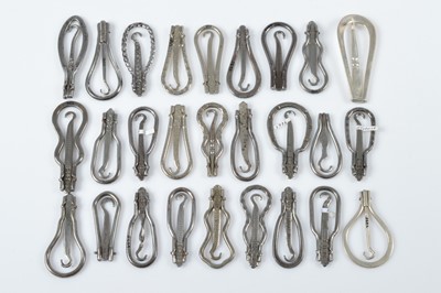 Lot 550 - A quantity of folding button or glove hooks