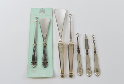 Lot 561 - Three sets of silver handled instruments