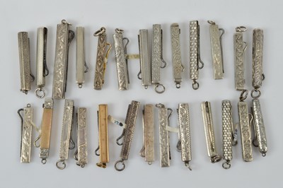 Lot 574 - A collection of silver and silver gilt cased button hooks