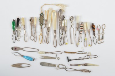 Lot 600 - A collection of silver button loops