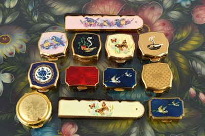 Lot 614 - Eight 1950s gilt metal Stratton pill boxes
