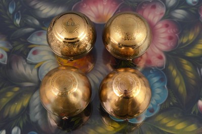 Lot 625 - Four 1950s Pygmalion gilt metal spherical compacts