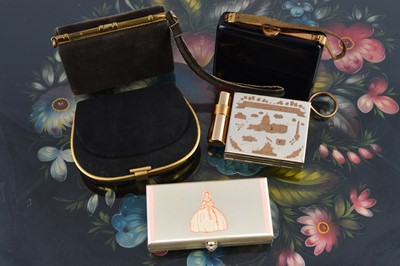 Lot 627 - Five 1940s and later gilt metal and chromed carryalls