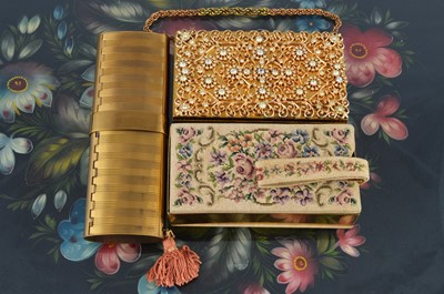 Lot 628 - Three rectangular gilt metal carryalls