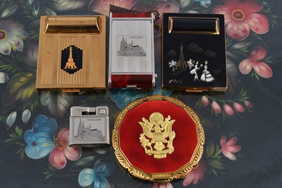 Lot 632 - Four 1950s souvenir compacts