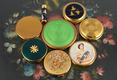 Lot 647 - Five 1950s circular gilt metal Mascot powder compacts