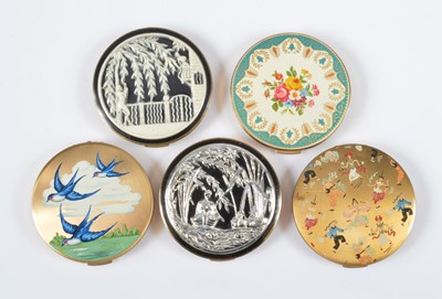 Lot 668 - Circular gilt metal Stratton compacts in the Corona or Regal style c1950s