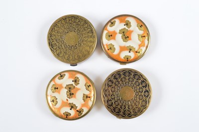 Lot 677 - Two 1930s circular Coty Lalique puffs