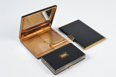 Lot 697 - Three rectangular Art Deco black enamel and gilt metal rectangular carryalls