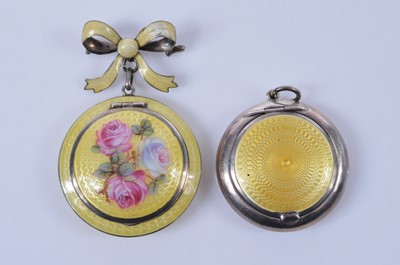 Lot 718 - A yellow guilloche enamel decorated silver brooch or pendant compact