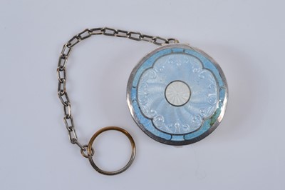 Lot 719 - Three circular silver blue guilloche enamel mounted compacts