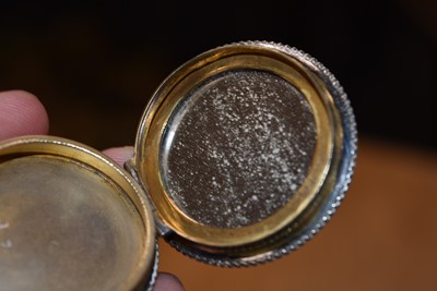 Lot 719 - Three circular silver blue guilloche enamel mounted compacts