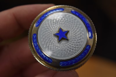 Lot 719 - Three circular silver blue guilloche enamel mounted compacts