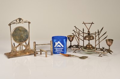 Lot 200 - An antique silver-plated toast rack