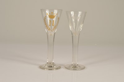 Lot 29 - Two interesting antique wine or cordial glassed with crowned "N" cyphers within laurel wreaths