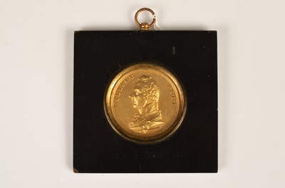 Lot 37 - A Regency Gilt-Brass Portrait Plaque of William Pitt in papier mâché frame circa 1806