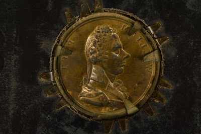 Lot 37 - A Regency Gilt-Brass Portrait Plaque of William Pitt in papier mâché frame circa 1806
