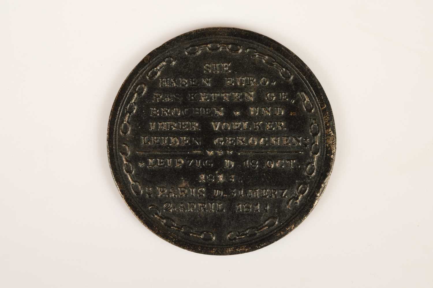 Lot 47 - An early 19th Century German cast iron medal commemorating the Battle of Liepzig and Fall and Treaty of Paris