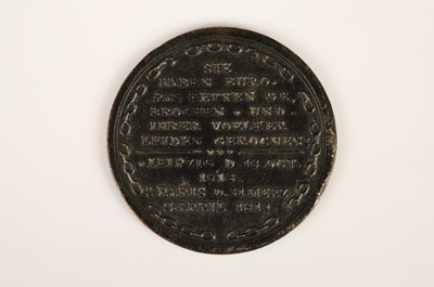 Lot 47 - An early 19th Century German cast iron medal commemorating the Battle of Liepzig and Fall and Treaty of Paris