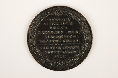 Lot 47 - An early 19th Century German cast iron medal commemorating the Battle of Liepzig and Fall and Treaty of Paris