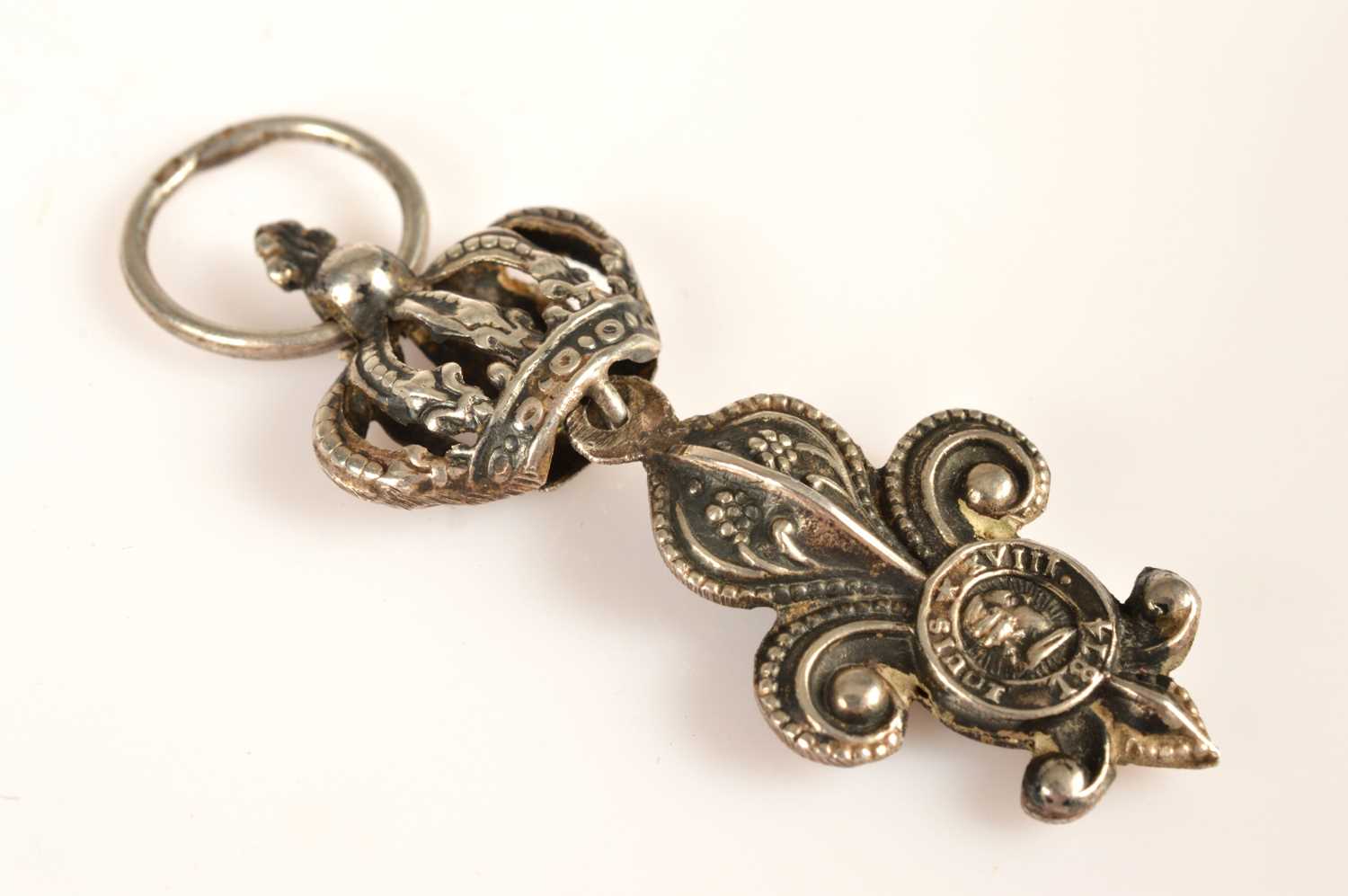 Lot 62 - A silver very early "irregulières" form of the Louis XVIII "La Décoration du Lys"