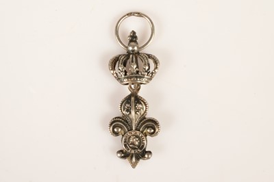 Lot 62 - A silver very early "irregulières" form of the Louis XVIII "La Décoration du Lys"
