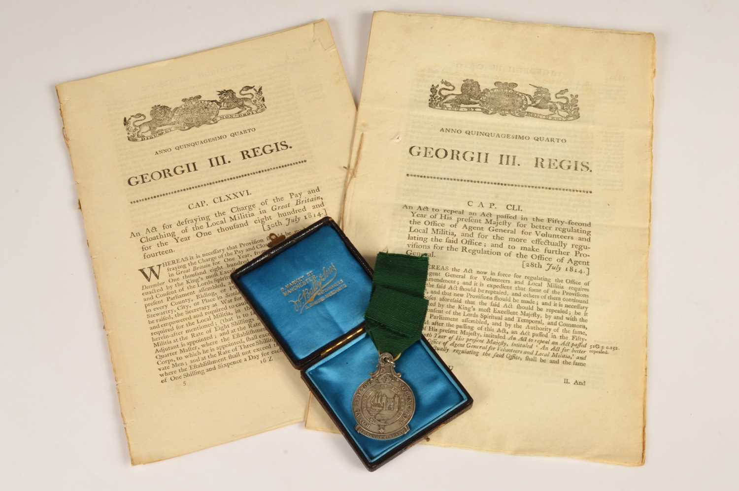 Lot 90 - Regency Royal Bristol Volunteers Disbanded Medal 1814 together with three Volunteer Militia Acts of Parliament