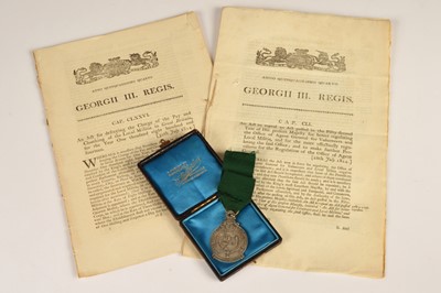 Lot 90 - Regency Royal Bristol Volunteers Disbanded Medal 1814 together with three Volunteer Militia Acts of Parliament