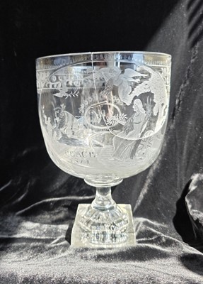 Lot 94 - A very large Regency era engraved glass rummer commemorating 'Peace' and dated '1814'