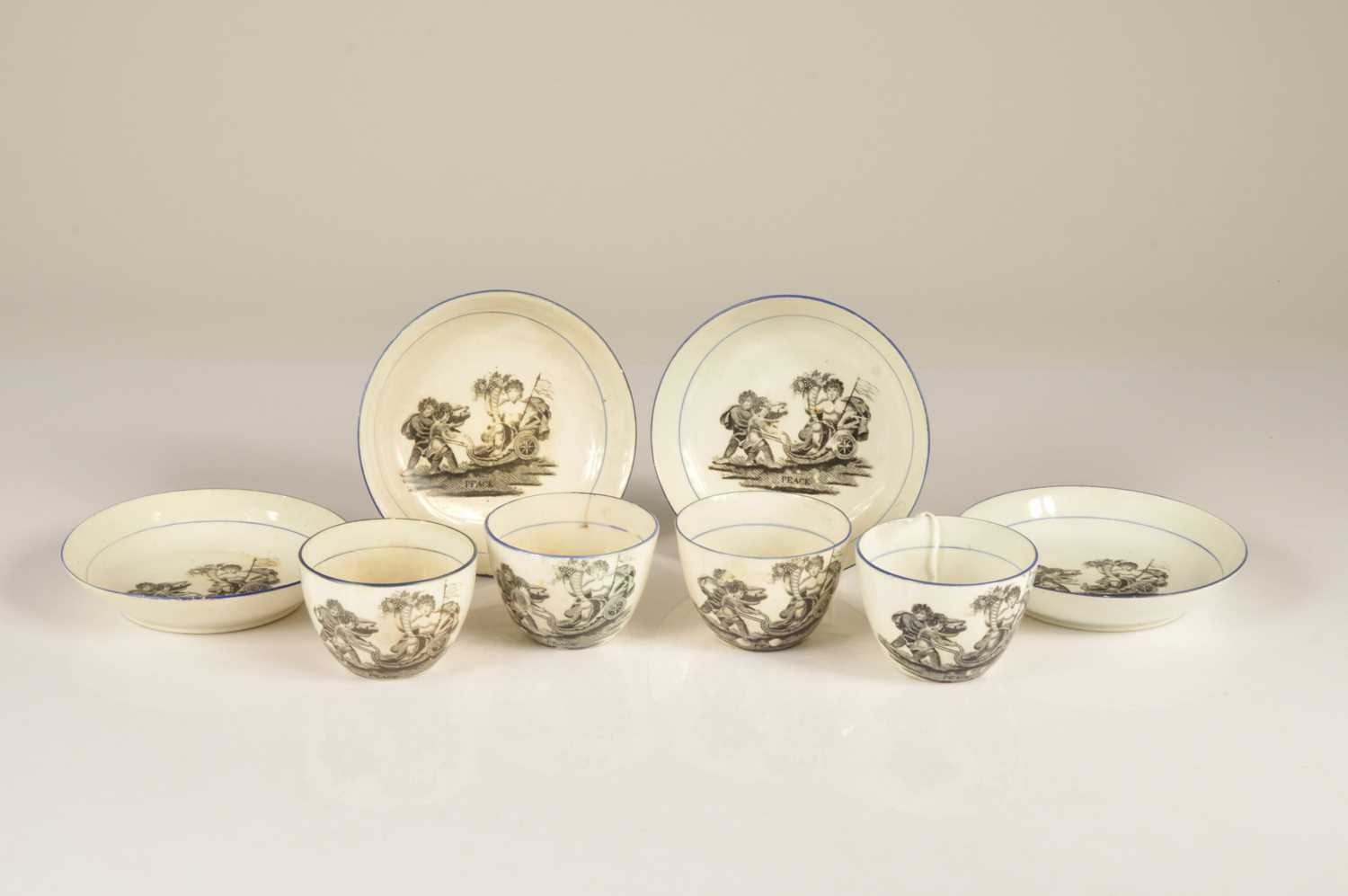 Lot 96 - Four Regency era bat printed pearlware cups and saucers commemorative of "Peace"