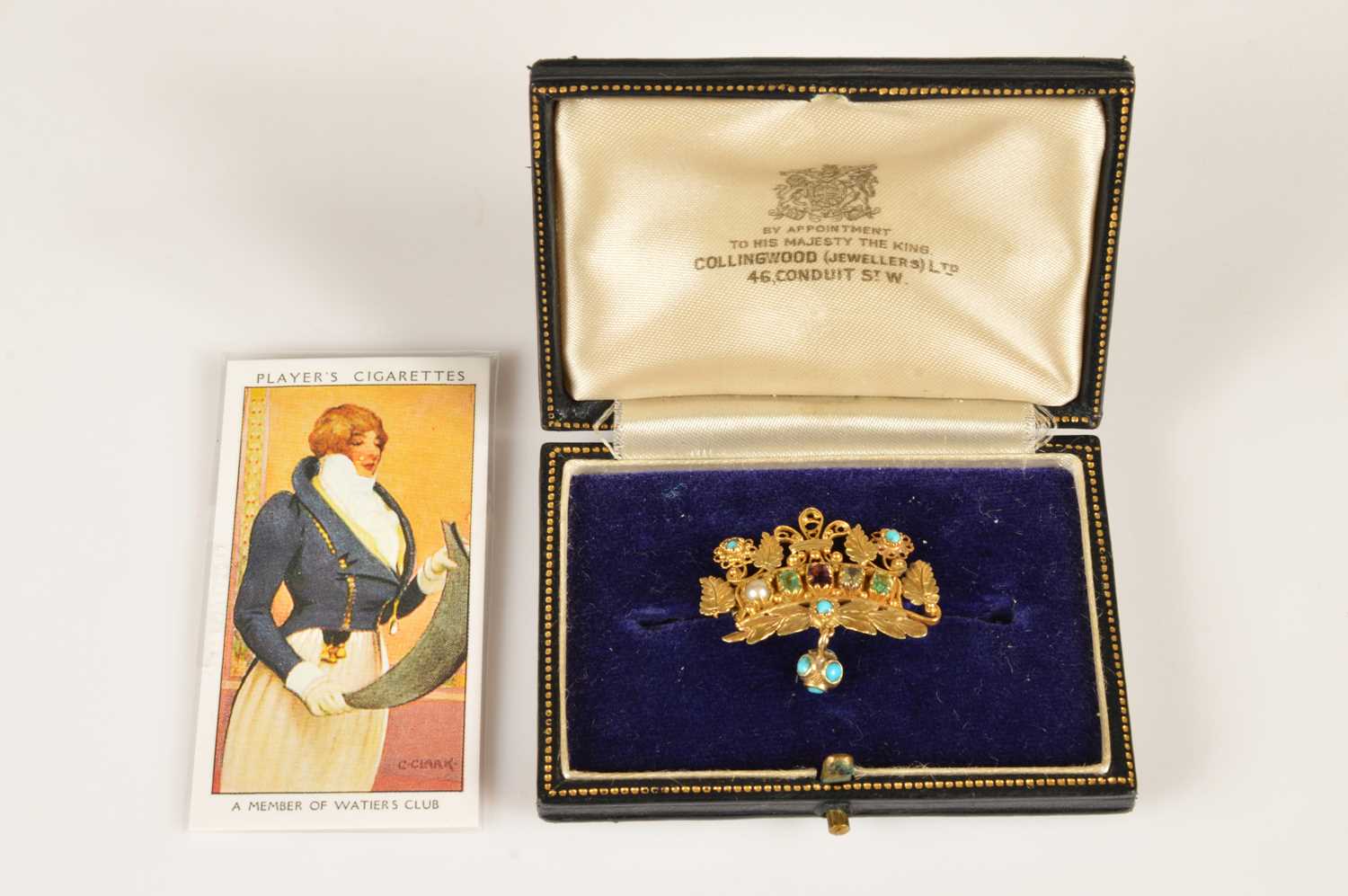 Lot 151 - A Regency era gold and gemset acrostic "PEACE" brooch from Watier's Fête of 1814