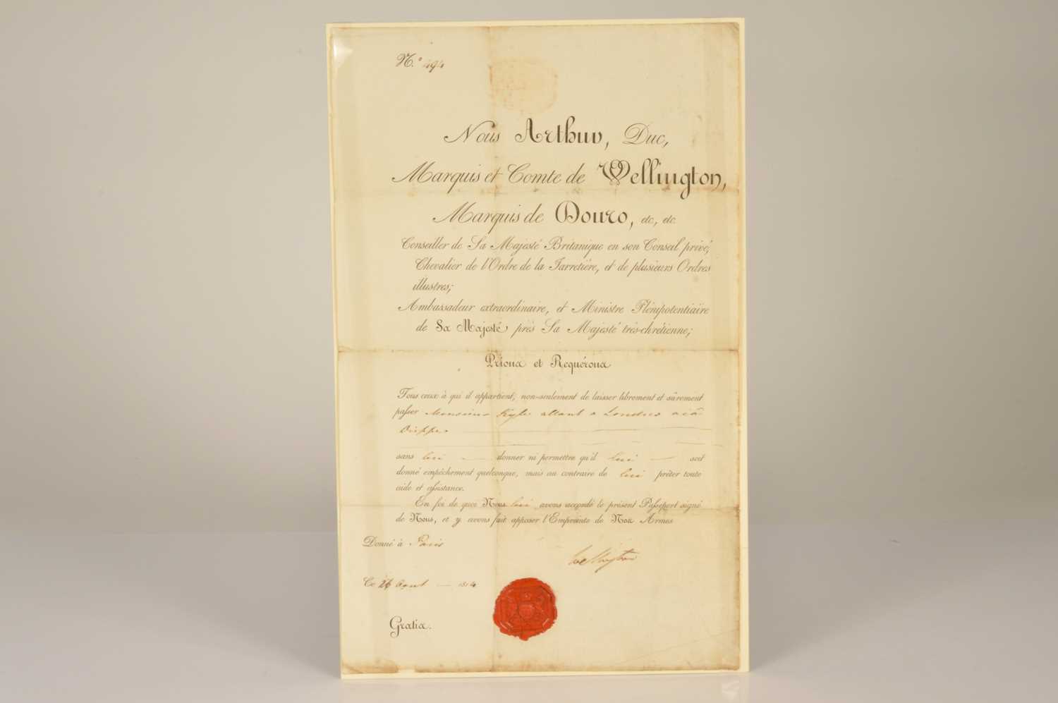 Lot 222 - An exceptionally rare 1814 Passport signed by the Duke of Wellington as British Ambassador to France