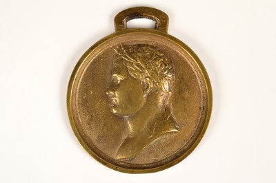 Lot 231 - A cast brass wall plaque with a relief profile bust of Napoleon Bonaparte