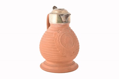 Lot 252 - A silver topped pottery Commemorative Water Jug by Watcombe (Torquay)