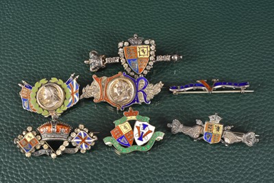 Lot 299 - A group of seven silver and enamel Queen Victoria Diamond Jubilee Pin Brooches