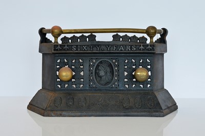 Lot 356 - A Victorian Cast iron and brass Diamond Jubilee Fire Tidy