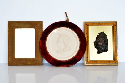 Lot 374 - A circular plaster plaque by J.Johnson