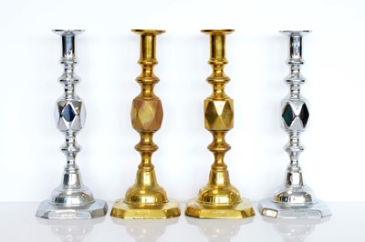 Lot 375 - Two pairs of metal candlesticks