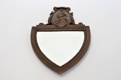 Lot 391 - A heavy cat metal wall mirror