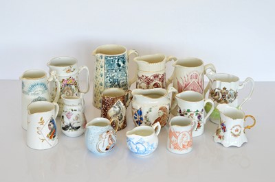 Lot 393 - A collection of ceramic water jugs