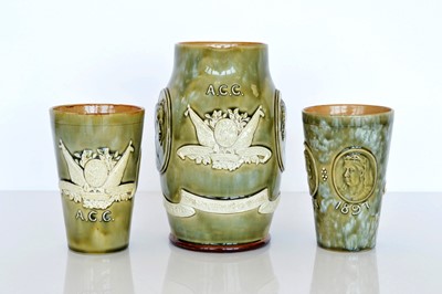 Lot 411 - A Commemorative Doulton Lambeth Water Jug ad Beakers