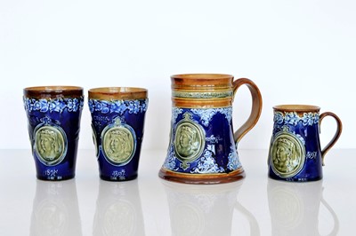 Lot 413 - A small selection of Doulton Lambeth Commemorative stoneware items