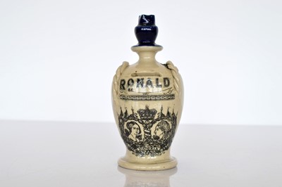 Lot 449 - An unusual stoneware flagon/money box