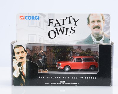 Lot 183 - A Corgi Classics 00802 Fawlty Towers Austin 1300 Estate & Basil Fawlty Figure