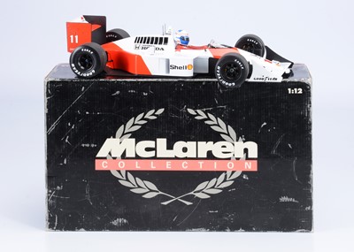Lot 261 - A Minichamps 1:12 Scale McLaren MP4-4 Formula 1 Car (A. Prost) 1988